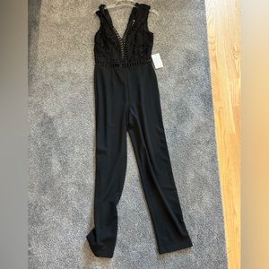 NWT black pant jumpsuit with lace detail